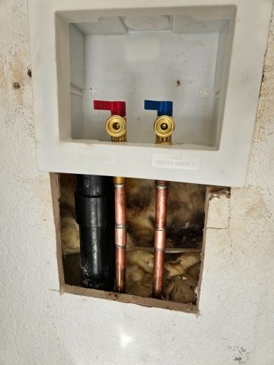 Washing machine plumbing hookups Recessed washing machine hookups with exposed drain piping below