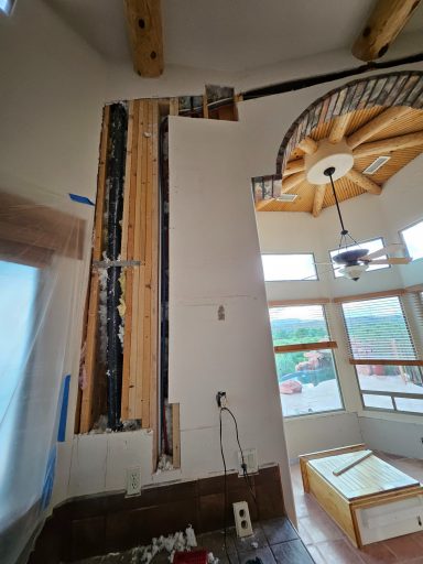 Plumbing inside an open wall Open interior wall exposing plumbing lines