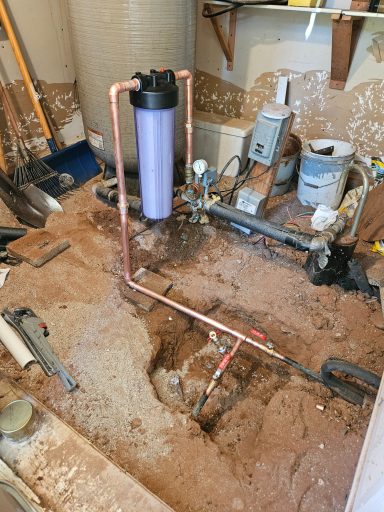 Water treatment plumbing Water treatment equipment and piping in a utility area