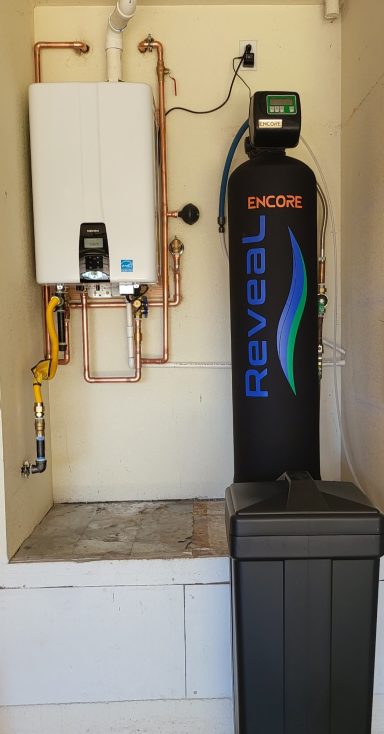 Tankless water heater and water conditioner Navien tankless water heater beside an Encore Reveal water conditioner
