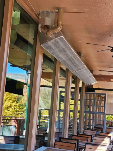 Covered patio heater Ceiling-mounted heater above a covered patio