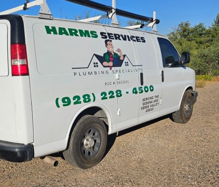 Harms Services work van Harms Services work van parked at a job site